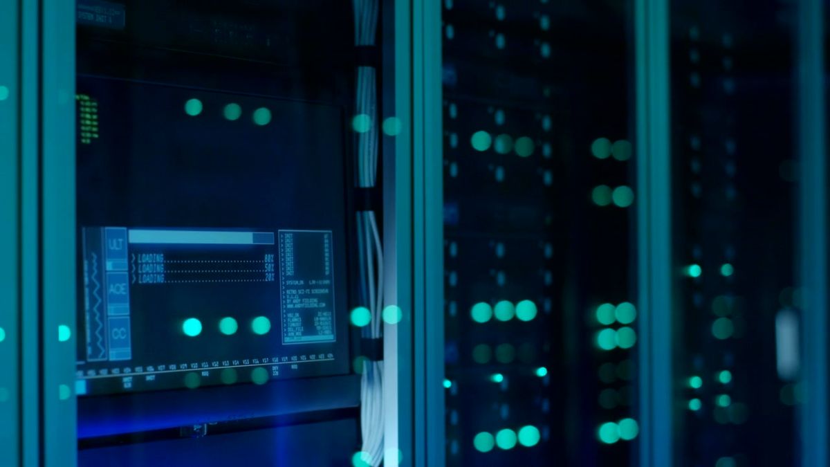 Status lights glowing on the front of server racks
